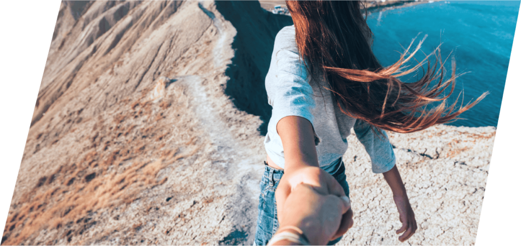 XCOPRI Epilepsy Patient Holding Partner's Hand on Beach