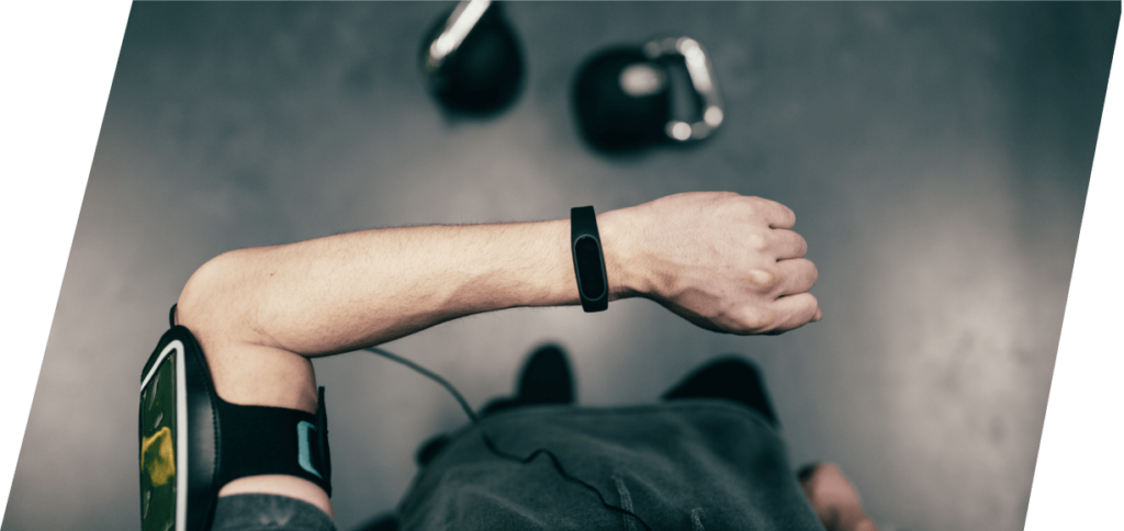 XCOPRI Epilepsy Patient Looking at Watch in Gym