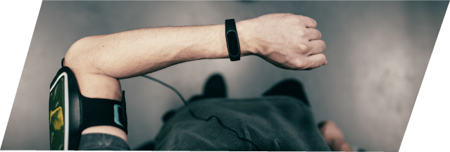 XCOPRI Epilepsy Patient Looking at Watch in Gym
